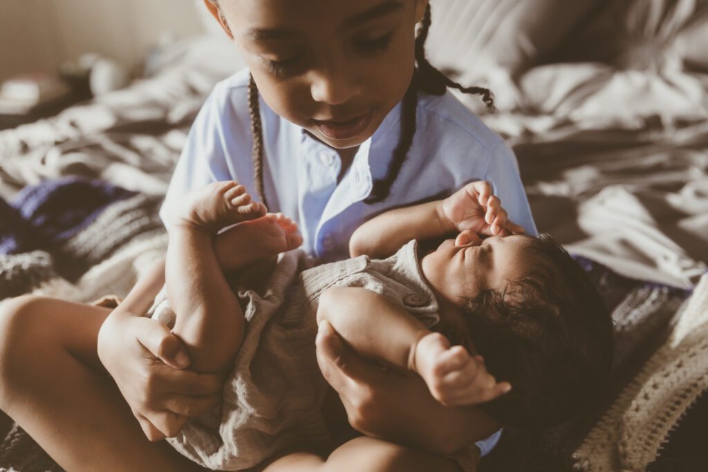 In home newborn session in various poses