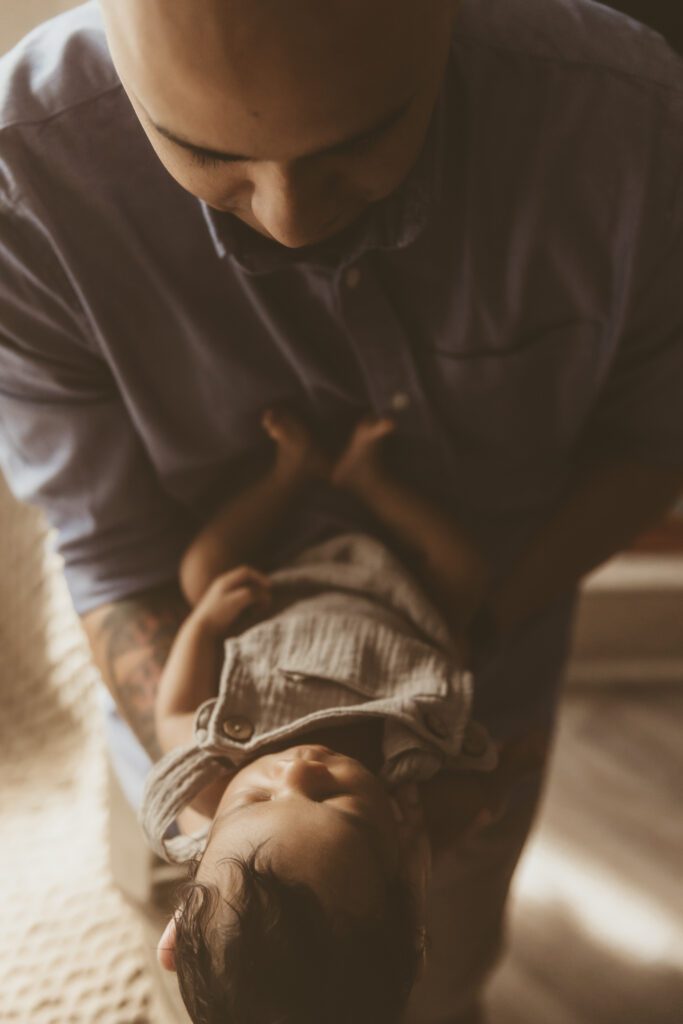 In home newborn session in various poses