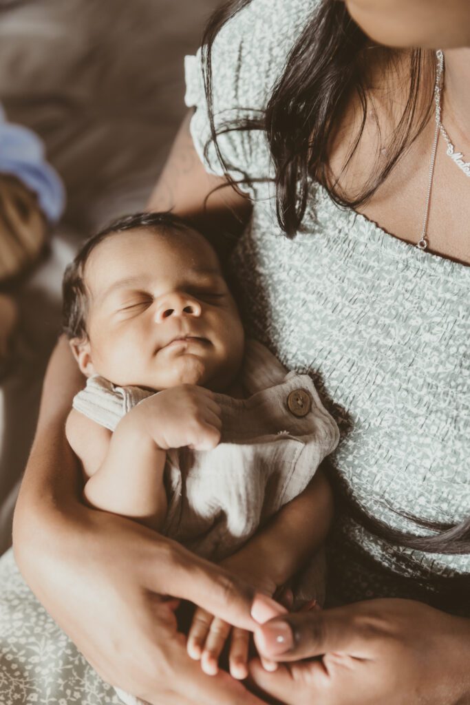 In home newborn session in various poses