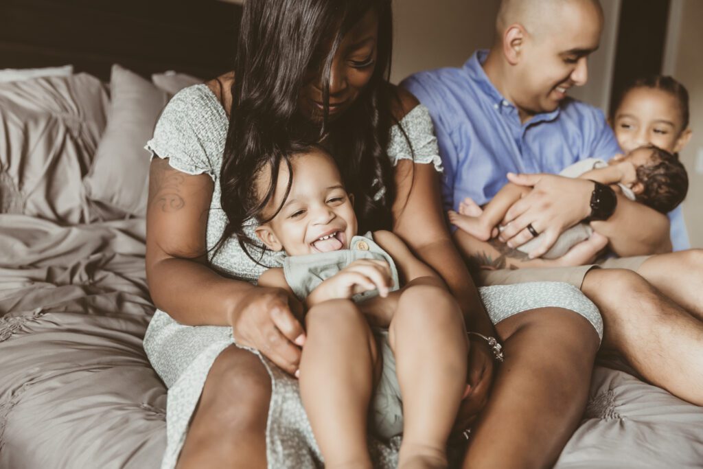 In home newborn session in various poses